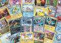 100 Mixed Pokemon Cards Plus 7 Holo Foils
